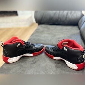 7Y black and red jordan retros.